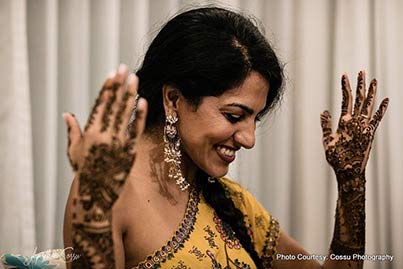 Indian bride Blushing at the Mehndi Ceremony