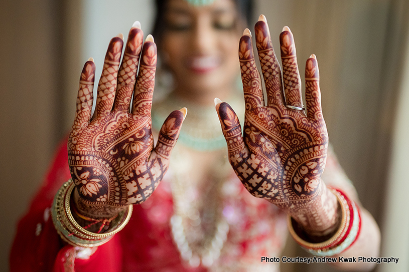 Indian bride shows her Mehndi