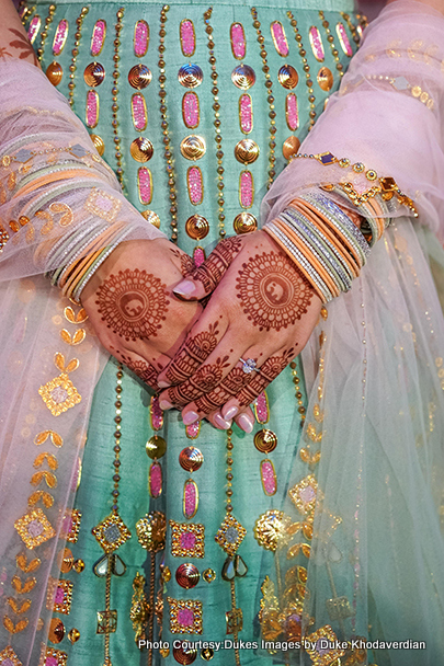 Indian bride shows her mehndi