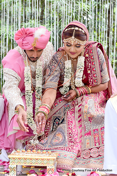 Indian wedding couple doing wedding rituals