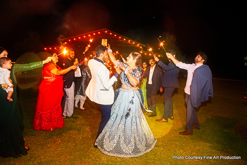 Indian wedding couple dancing together