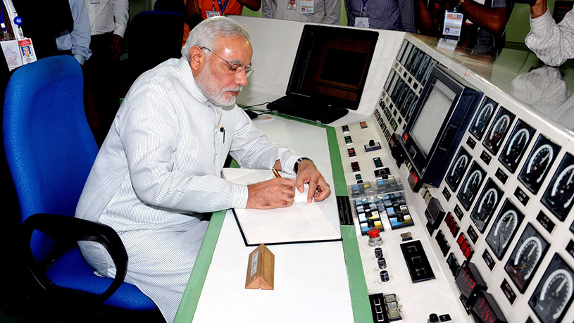 PM at BARC mumbai The Prime Minister, Shri Narendra Modi signing the visitors book, during his visit at the Bhabha Atomic Research Centre (BARC), in Mumbai on July 21, 2014.